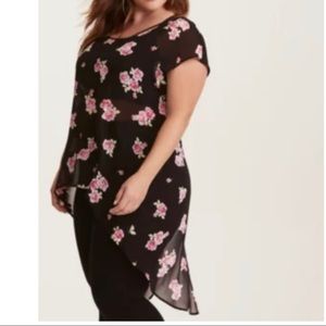 Sheer sleeveless top with split back